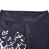 Sports women`s leggings  with a tree print