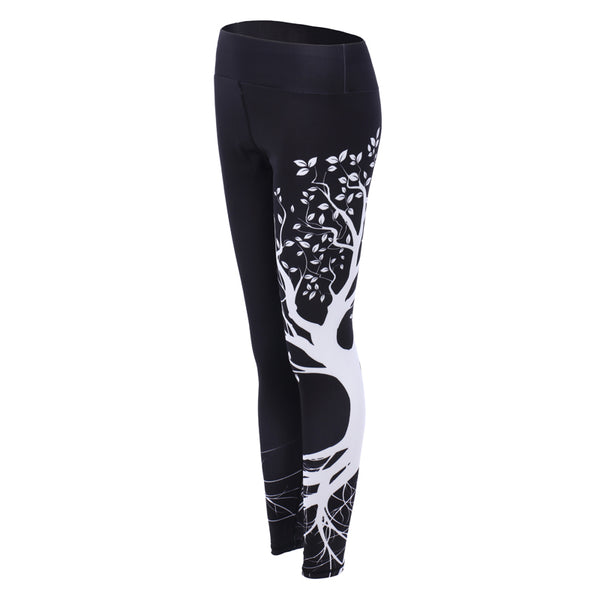 Sports women`s leggings  with a tree print