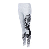 Sports women`s leggings  with a tree print