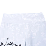 Sports women`s leggings  with a tree print